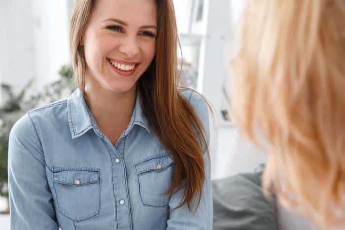 woman-laughing-at-va-ent-doctors-office ENT services