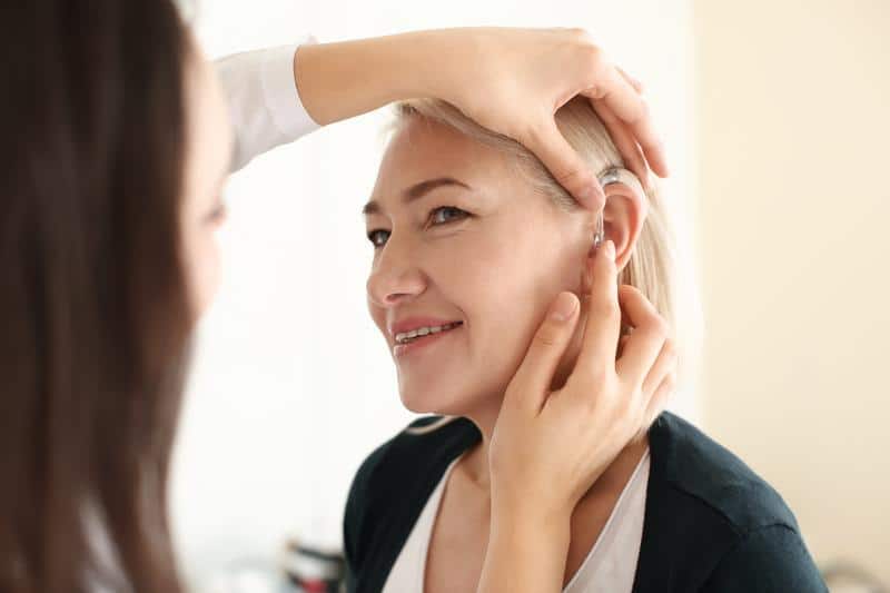 woman-hearing-aid-fitting