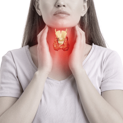 Woman rubbing her through with illustration of her thyroid in red in the center of her throat, representing thyroid disorders