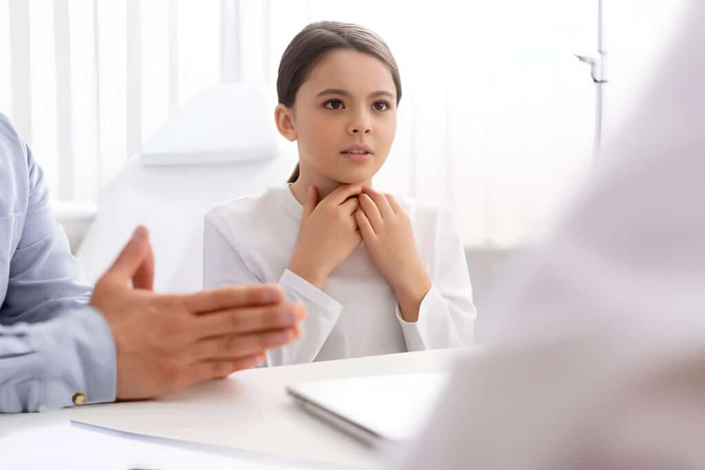 girl-neck-mass-holding-throat-virginia-ent-Picsart-AiImageEnhancer